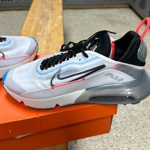 Men’s size 14 Nike Air 2090. Great sneakers but we’re a little big on me. NIB